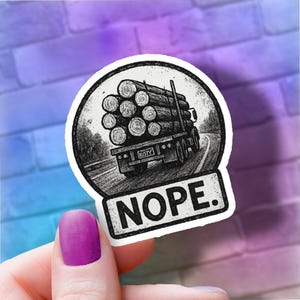May include: A black and white sticker featuring a truck hauling logs on a winding road. The truck has the license plate "RUSTY" and the word "NOPE." is below the image. The sticker is round with a white border.