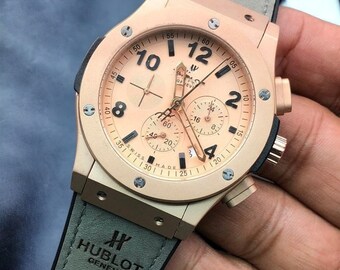 Hub quartz herenhorloge met zwarte rubberen band en 41 mm roségouden kast