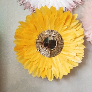 Jujuhat yellow feathers and golden raffia
