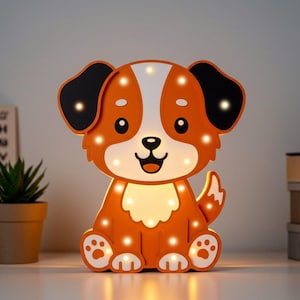 Puede incluir: Luz nocturna de madera naranja y blanca con forma de perro de dibujos animados con una cara sonriente. El perro tiene orejas negras y una cola. La luz nocturna tiene pequeñas luces LED blancas alrededor del cuerpo del perro.
