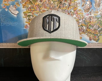 Markitos Toys gorra gris trébol, Markitos toys grey flat bill SnapBack hat, free decal and free shipping!