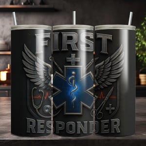 May include: Black tumbler with the words "FIRST RESPONDER" and a medical emblem with wings. The design includes a stethoscope, scissors, and a cross. The tumbler has a silver lid and a straw.