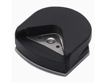 Corner Hole Punch Punches a Perfectly Placed Hole in Corners of