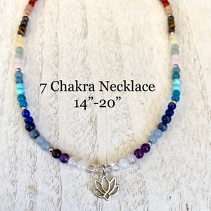 May include: A 7 Chakra necklace with a silver lotus charm. The necklace is made with colorful beads and is adjustable from 14 to 20 inches.