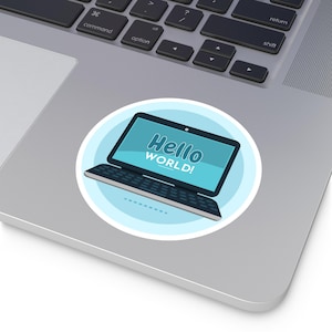 May include: A blue and white laptop sticker featuring a laptop with the words "Hello World!" displayed on the screen in a blue font.