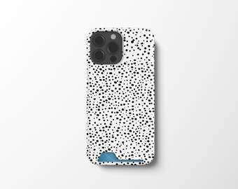 May include: White phone case with a black polka dot pattern. The case has a cutout for the camera lens.