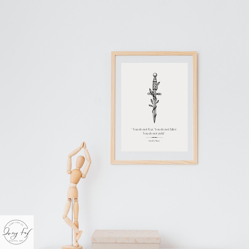 May include: A black and white printable art print featuring a sword with vines. The quote "You do not fear. You do not falter. You do not yield." by Sa'id J. Musa is printed below the sword.