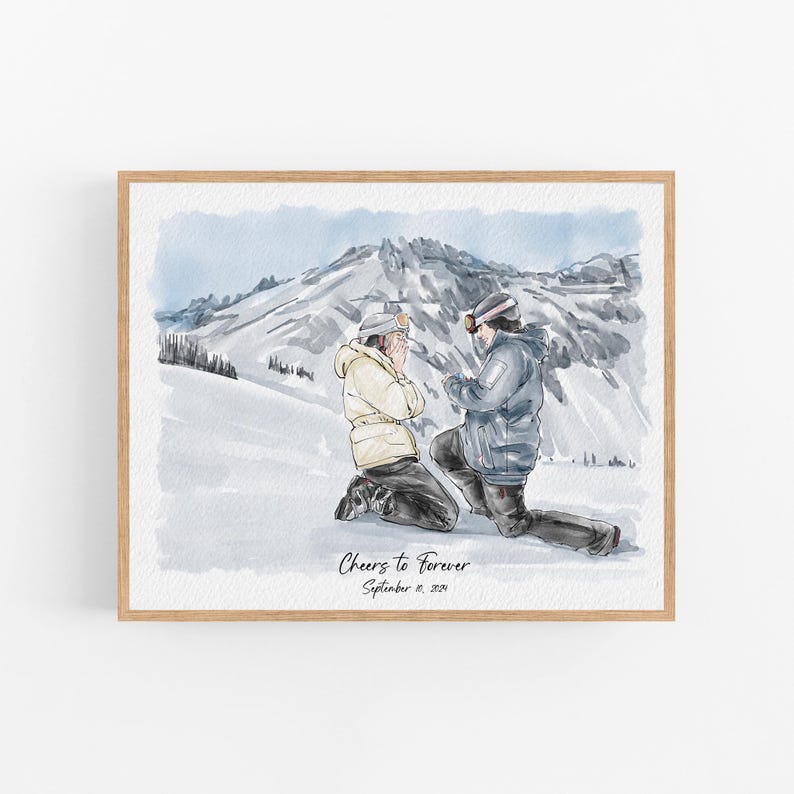 May include: A watercolor print in a light wood frame depicting two individuals in ski gear on a snowy mountain. One person kneels in a dark jacket while the other stands in a cream jacket. The text reads Cheers to Forever September 10, 2021.