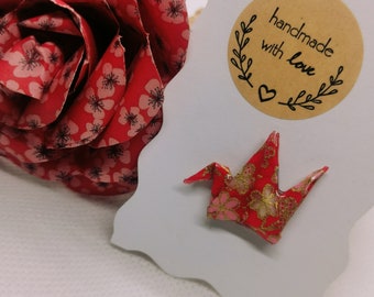 Hand-folded origami crane pin