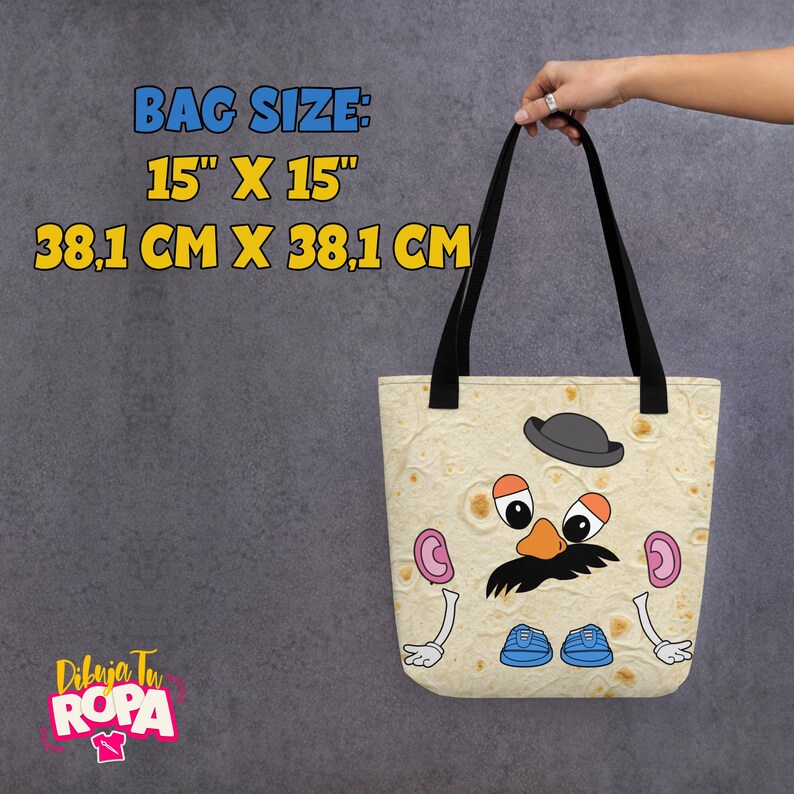 May include: Tote bag with a cartoon character design. The bag is beige with a repeating pattern and features a character's face with a black mustache, orange nose, and blue shoes. The bag size is 15" x 15".
