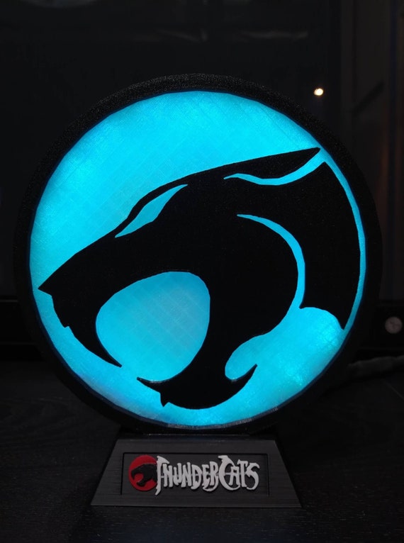 blaues-thundercats-logo-roter-l-we-rotes-l-wen-logo-emblem