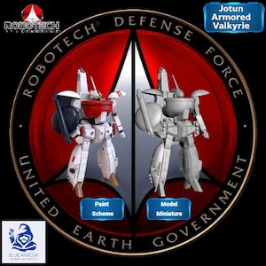May include: An image showcasing two robot models, one painted and one unpainted, against a circular background. The painted model is white and red, while the unpainted one is gray. Text includes "ROBOTECH DEFENSE FORCE" and "Jotun Armored Valkyrie."