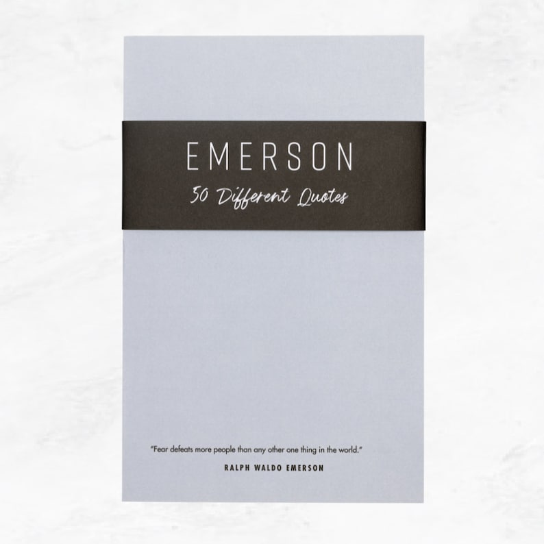 Elusive Blue colored notepad with a black belly band that says: Emerson 50 Different Quotes. A Ralph Waldo Emerson quote about fear is written across the bottom in a modern font.