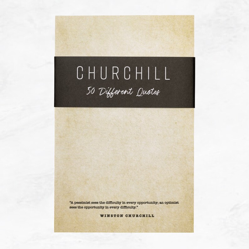 Antique colored notepad with a black belly band that says: Churchill 50 Different Quotes. A Winston Churchill quot is written across the bottom in a typewriter font.