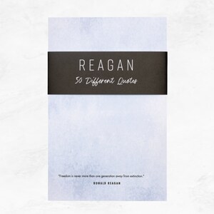 Light blue textured notepad with a black belly band that says: Reagan 50 Different Quotes. A Ronald Reagan quote about freedom is written across the bottom in a modern font.