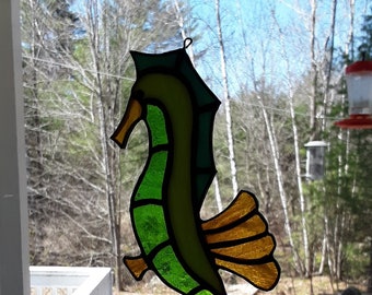 Seahorse swimming suncatcher