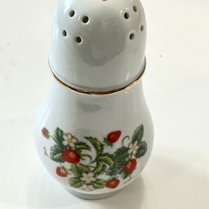 Rare vintage Porcelain 1978 Avon salt and pepper shaker- with 22K gold trim