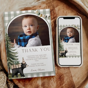 May include: A baby's thank you card with a photo inside a green and white checkered arch. The card includes the text "THANK YOU" and a message. A watercolor illustration of a bear carrying gifts is also featured.
