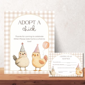 May include: Party decorations with an 'Adopt a Chick' theme. The main sign features two cartoon chicks in party hats, with the text 'ADOPT A chick'. A smaller certificate of adoption is also included, with space to fill in details.