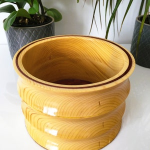 Turned wood bowl with copper epoxy inlay and bottom