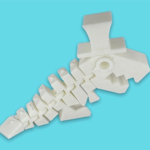 Juguete antiestrés y modelo Flexi Sir Flexington Rexington