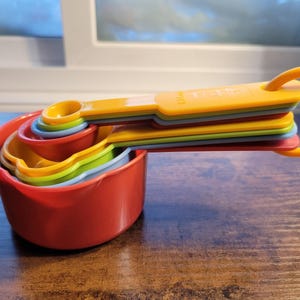 Set Of 8 Multi-Color Nesting Measuring Cups & Spoons