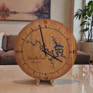 Rustic personalized lake map clock displayed as lake house or cabin decor
