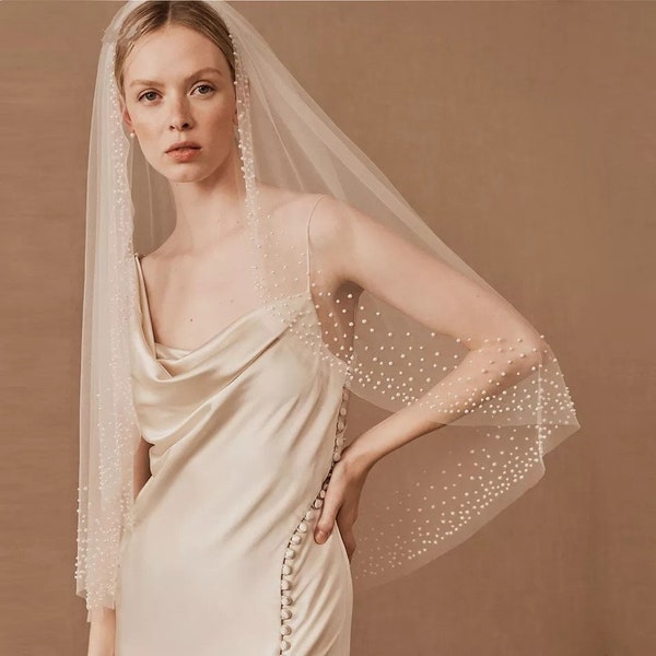 Stunning off white wedding veil with pearl accents