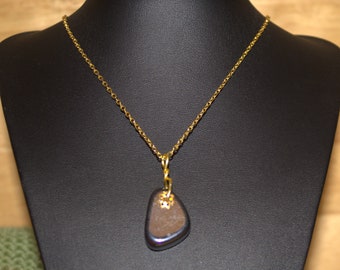 Gold-plated necklace with hematite stone.