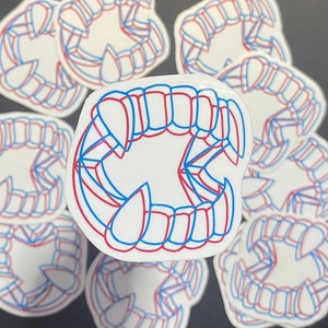 Just Fangtastic 3D vampier tanden sticker rood en blauw anaglyph halloween