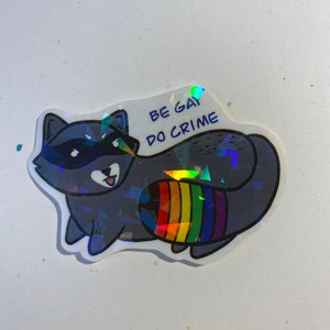 Be Gay Do Crime Pride Raccoon Holographic Sticker lgbtqia