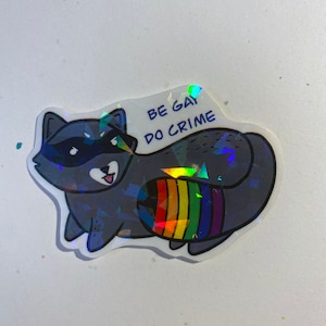 Be Gay Do Crime Pride Raccoon Holographic Sticker lgbtqia