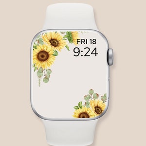 May include: White Apple Watch with a sunflower and eucalyptus floral design wallpaper. The watch face displays the time as 9:24 and the date as FRI 18.