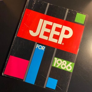May include: A black and red brochure with the word "Jeep" in white letters and the text "For 1986" in green letters. The brochure has a colorful design with red, blue, green, and pink squares.