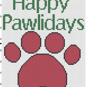 Könnte beinhalten: Kreuzstichmuster mit den Worten "Happy Pawlidays" in Grün über einem roten Pfotenabdruck. Das Design befindet sich auf einem weißen Gitterhintergrund, ideal für ein Bastelprojekt zum Thema Feiertage.