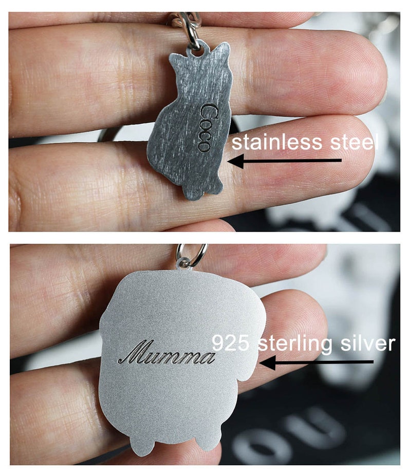 May include: Two silver pet ID tags, one with the name "Coco" engraved on a stainless steel tag, and the other with the name "Mumma" engraved on a 925 sterling silver tag.