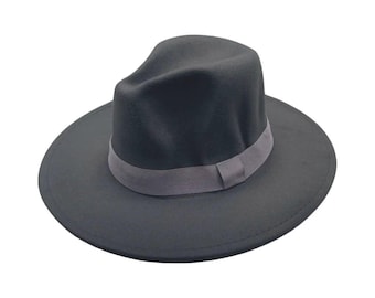 May include: A charcoal gray fedora hat featuring a structured crown with a central crease and a wide, flat brim. The hat is accented with a matching gray grosgrain ribbon band that encircles the base of the crown, finished with a small knot.