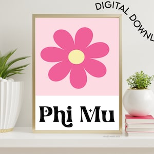 May include: Printable digital download of a pink and yellow daisy with the text "Phi Mu" in black. The background is a light pink.