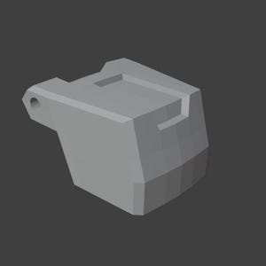 Puede incluir: Un componente geométrico tridimensional de color gris claro, sólido, con una forma angular y maciza que presenta una pestaña lateral saliente con un orificio circular. El objeto tiene una superficie superior plana con una muesca rectangular.