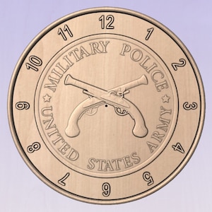 May include: A wooden clock face with the words "United States Army Military Police" and crossed pistols in the center. The numbers 1 through 12 are around the edge of the clock face.