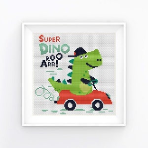 May include: A cross-stitch pattern featuring a green dinosaur wearing a hat and driving a red car. The text "SUPER DINO ROO ARR!" is above the dinosaur.