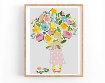 以下が含まれることがあります： ピンク、イエロー、ブルーの花束を持った女の子を描いたクロスステッチパターン。女の子はピンクのドット柄のドレスと赤い靴を履いています。