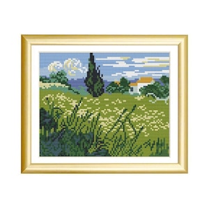 May include: A cross-stitch embroidery depicting a landscape with a tall dark green cypress tree, a field of light green and yellow grasses, and a small white house with a brown roof under a blue sky with white clouds, encased in a gold frame.