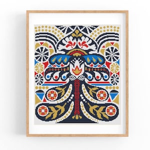 Puede incluir: Un patrón geométrico colorido con un motivo central que se asemeja a un árbol estilizado. El patrón presenta una mezcla de colores rojo, azul, amarillo y blanco sobre un fondo azul oscuro.