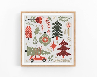 May include: A cross-stitch pattern featuring a red car carrying a Christmas tree, surrounded by stylized trees, ornaments, and stars. The design is in shades of red, green, and gold.