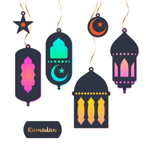May include: Five hanging Ramadan lanterns with a crescent moon and star design. The lanterns are in various colours, including pink, blue, yellow, and orange. The word "Ramadan" is written in gold lettering on a black tag.