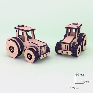 May include: Two wooden toy tractors, one red and one blue, with black wheels and details. The tractors are 65 mm wide, 80 mm tall, and 110 mm long.