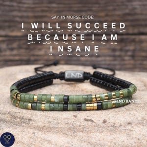 May include: A double-strand bracelet featuring green stone beads, gold-tone spacers, and black accents. A central black bead displays the text LND. The text SAY IN MORSE CODE: I WILL SUCCEED BECAUSE I AM INSANE is visible above the bracelet.