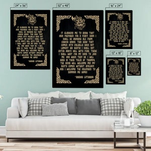 May include: A black canvas print with a gold border and a quote from the Norse god Odin. The quote reads, "It gladdened me to know that Odin prepares for a feast. Boon I shall be drinking ale from curved horns. This hero that comes into Valhalla does not lament his death! I shall not enter Odin's hall with fear. There I shall wait for my bond to join me. And when they do, I will bark in their tales of triumph. The acsir will welcome me! My death comes without apology! And I welcome the Valkyries to summon me home!" -Ragnar Lothbrok