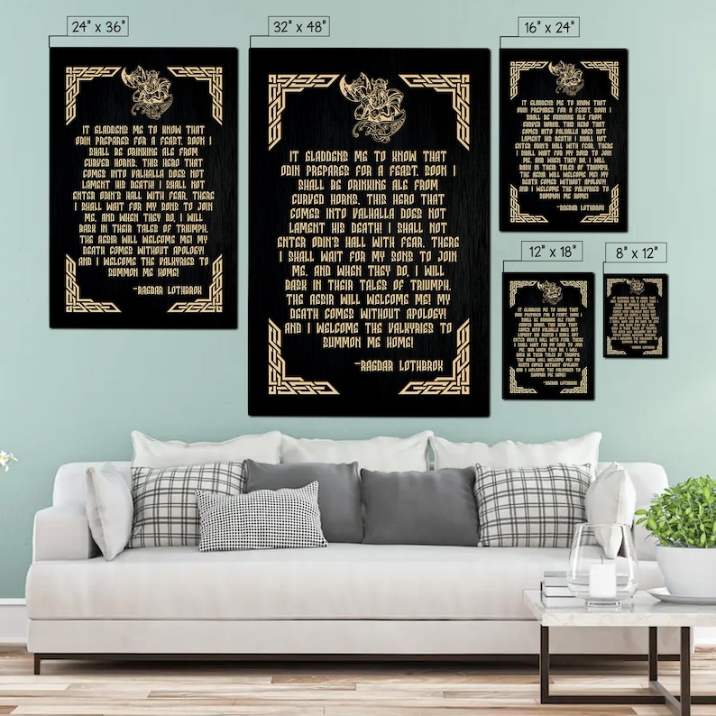 May include: A black canvas print with a gold border and a quote from the Norse god Odin. The quote reads, "It gladdened me to know that Odin prepares for a feast. Boon I shall be drinking ale from curved horns. This hero that comes into Valhalla does not lament his death! I shall not enter Odin's hall with fear. There I shall wait for my bond to join me. And when they do, I will bark in their tales of triumph. The acsir will welcome me! My death comes without apology! And I welcome the Valkyries to summon me home!" -Ragnar Lothbrok